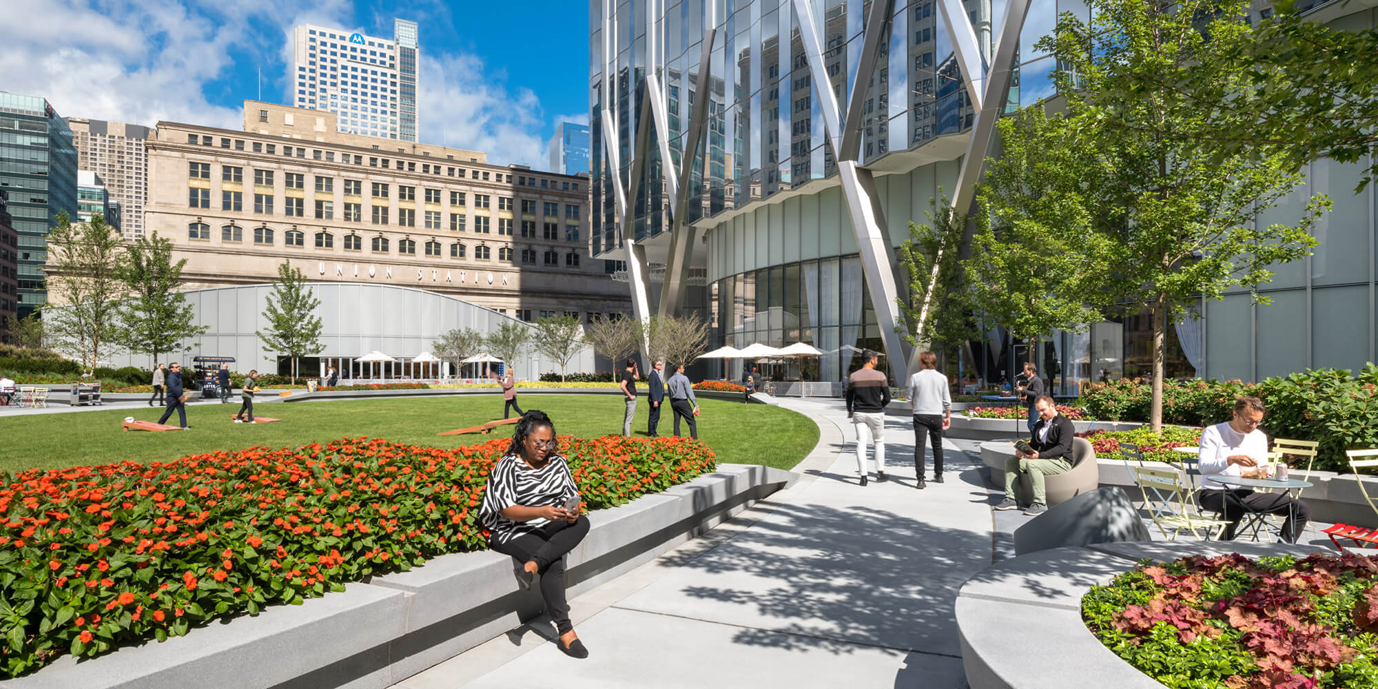 People use the outdoor space at The Green at 320